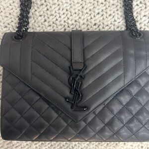 Classic Quilted YSL cross body bag in Black